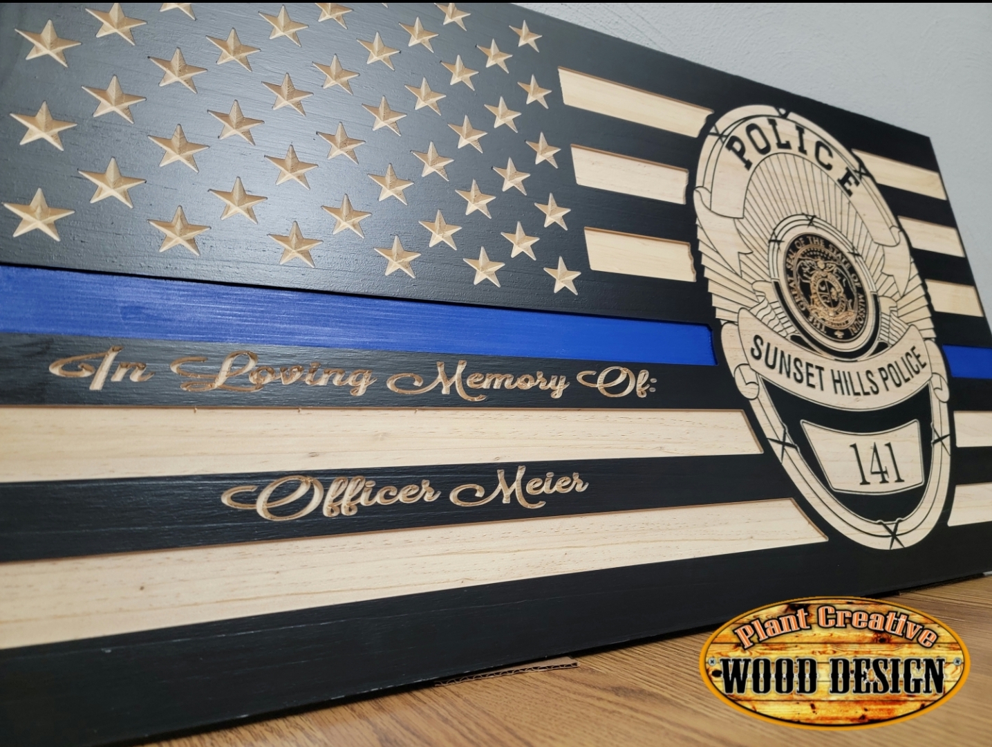 Customized thin blue line police flag with badge. We can add your local police name and badge #. 